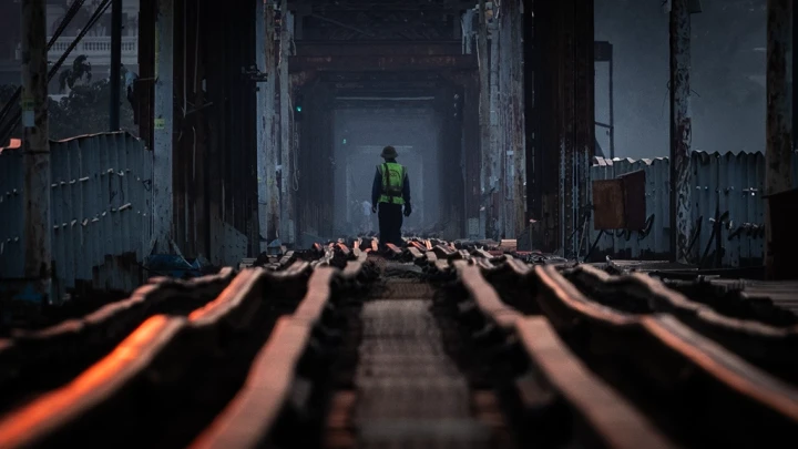Long Bien Bridge Worker On Track